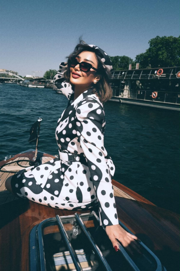 Reem Alswaidi Wears Fatima Al-Shahawani’s First Suit Designs
