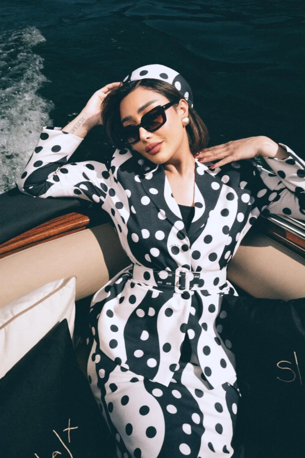 Reem Alswaidi Wears Fatima Al-Shahawani’s First Suit Designs