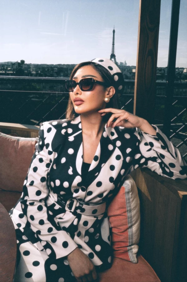 Reem Alswaidi Wears Fatima Al-Shahawani’s First Suit Designs