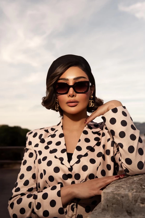 Reem Alswaidi Wears Fatima Al-Shahawani’s First Suit Designs